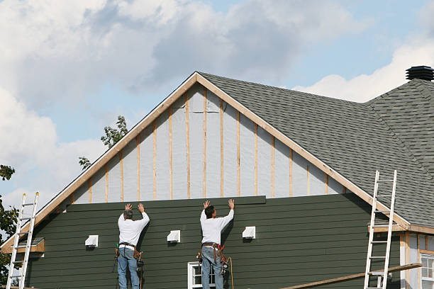 Professional Siding Replacement technician working in Dendron, VA